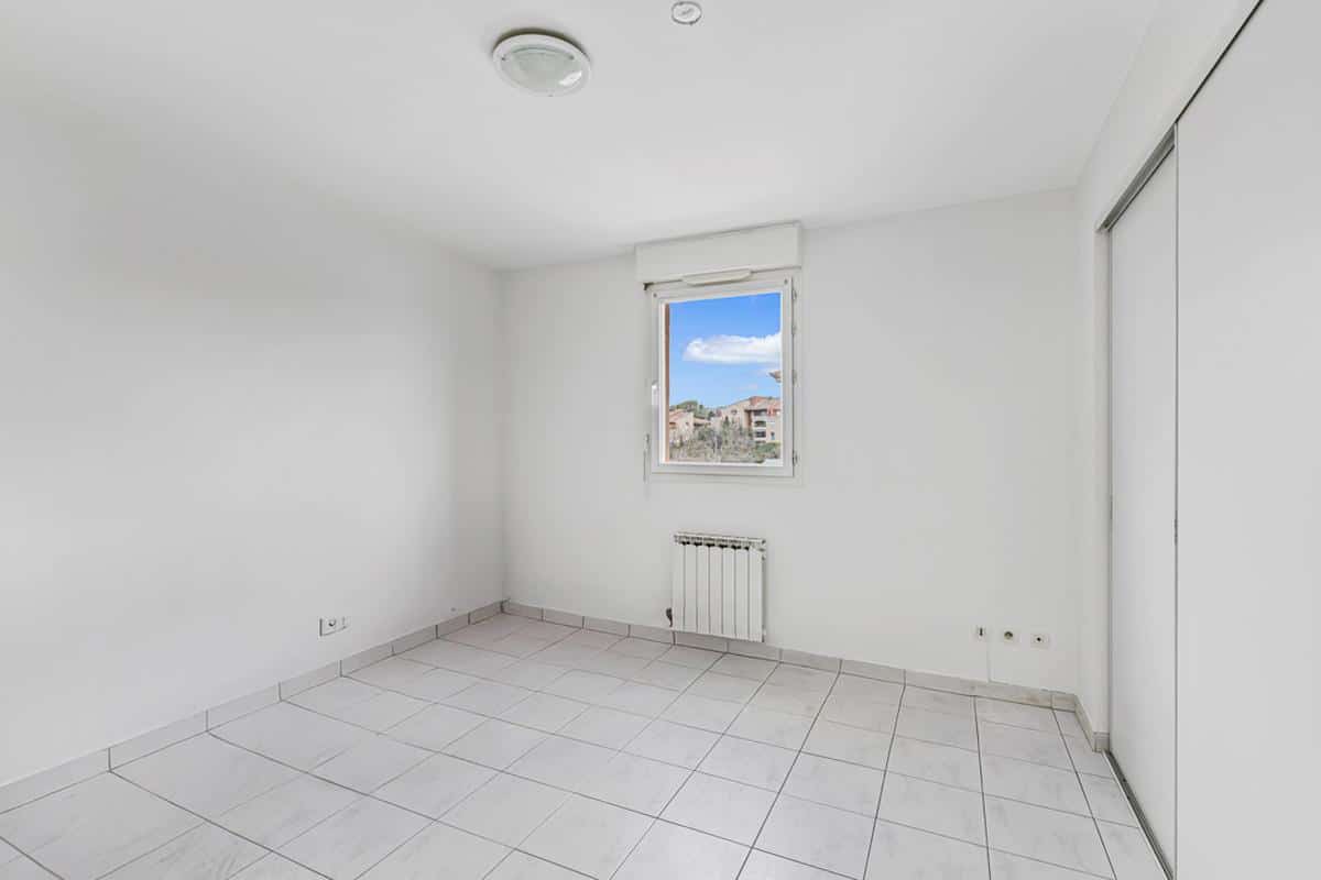 Appartement T3/4 – Terrasse caves et 2 places de parking
