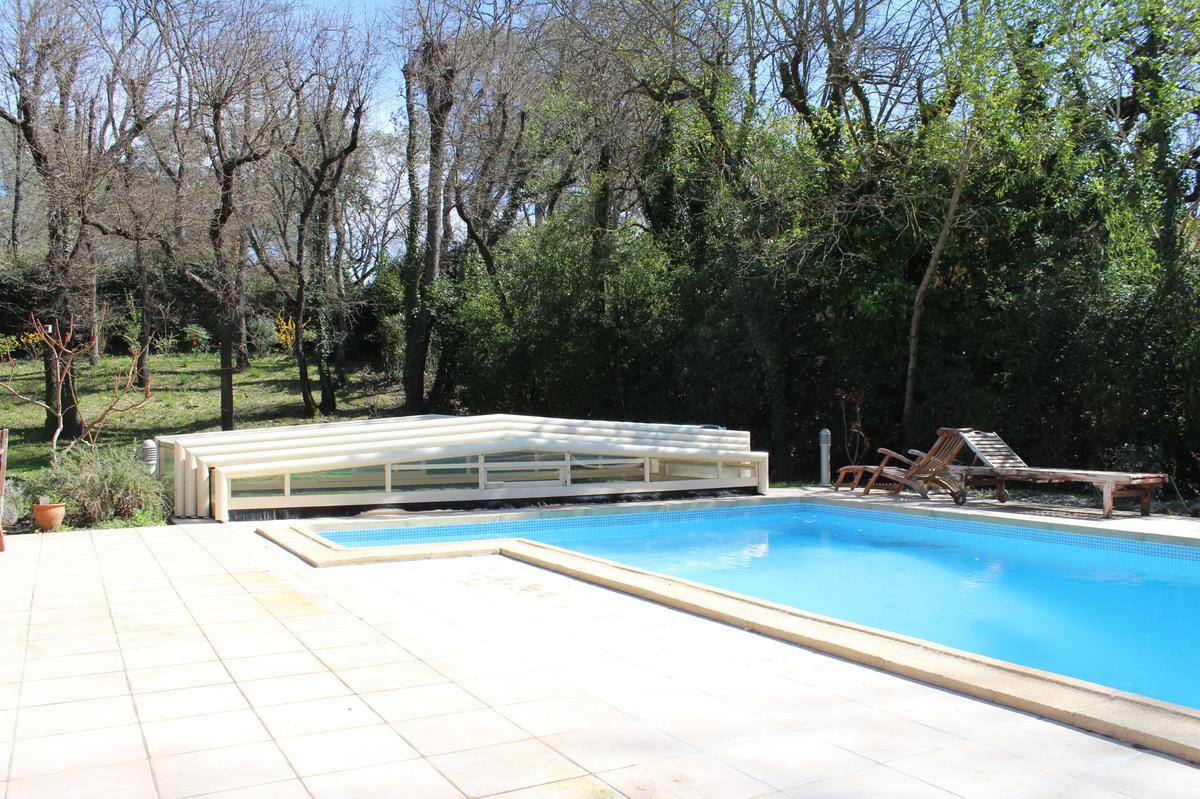 Beautiful villa with swimming pool and garden sports on a private estate