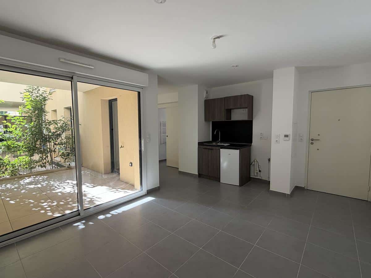 Studio récent avec balcon et parking – 305 rue Jean DAUSSET